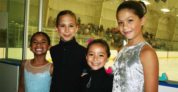 4-girls-at-the-Basic-Skills-Ice-Skating-Competition-opt Group of ice skaters at Rocket Ice Skating Rink preparing for the basic skills ice skating competition.