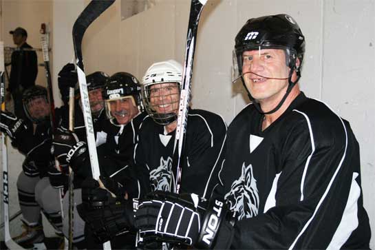Picture of men from The Rocket Ice Skating Rink's adult hockey league.
