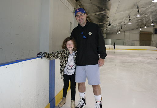 Ice skating rink near Chicago, Rocket Ice - dad and daughter skating.