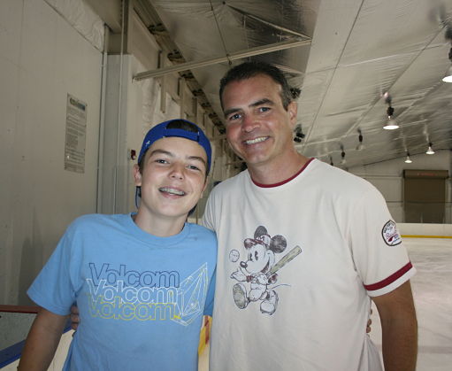 Ice skating rink near Lisle - boy and dad at Rocket Ice.