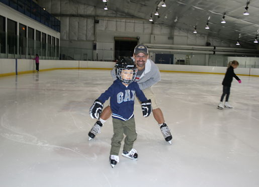 Ice skating rink near Lisle - young boy skating.