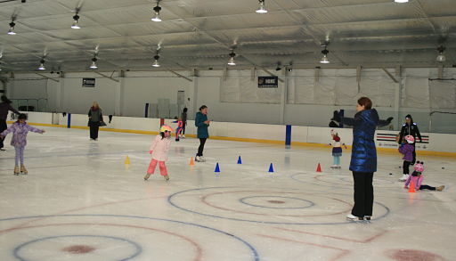 Ice skating rink near Lisle - girls skating at Rocket Ice.