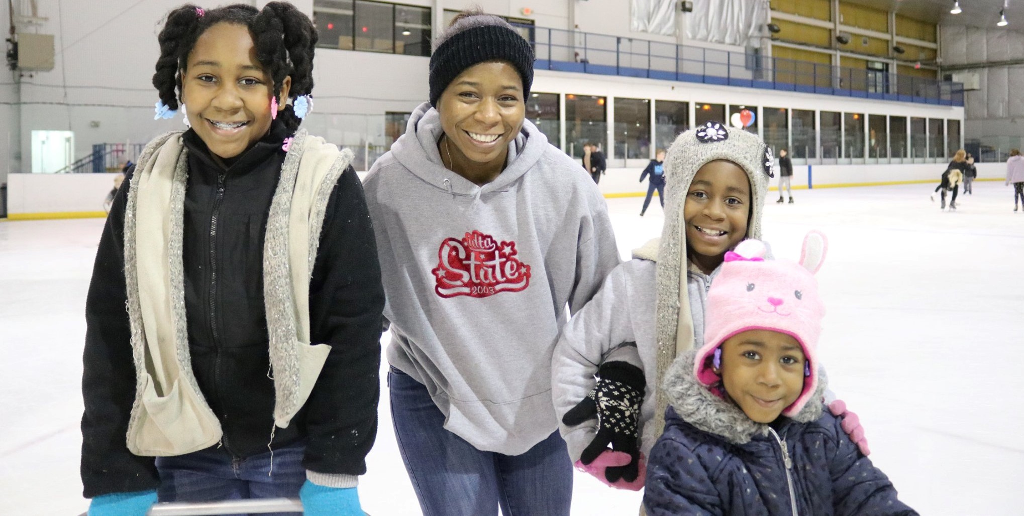 Ice Skating Family enjoying Rocket Ice Skating Rink Public Skate