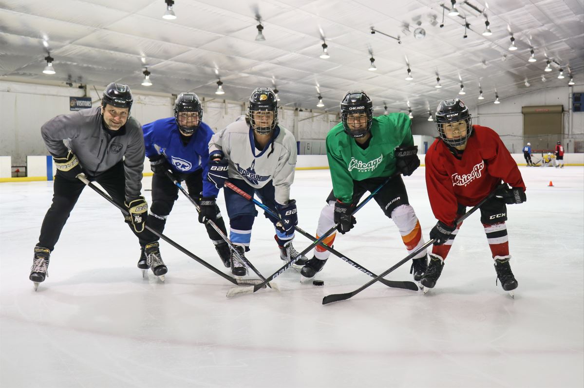 Hockey players improving their skills at Stick and Puck. A great way to spend a day off school or winter break is on the ice. Friendship, fitness and fun.